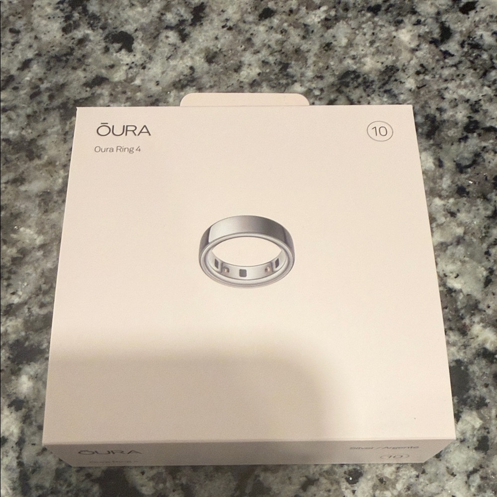 Used Oura Ring 4- Silver size 10. With charger and cord!
